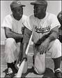 Jackie Robinson (1919-72) and Frank Robinson (1935-), 1956