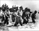 U.S. Gen. Douglas MacArthur coming ashore in the Philippines, Feb. 5, 1945